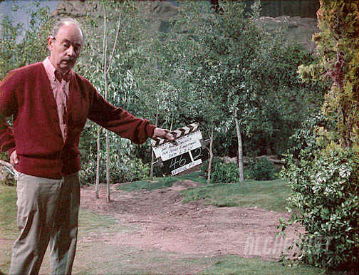 Someone's thrilled to be on the Star Trek set! "Note the stage wall visible behind the set in the upper right corner.